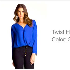 Bebe Twist Hem Blouse in Surf the Web Blue